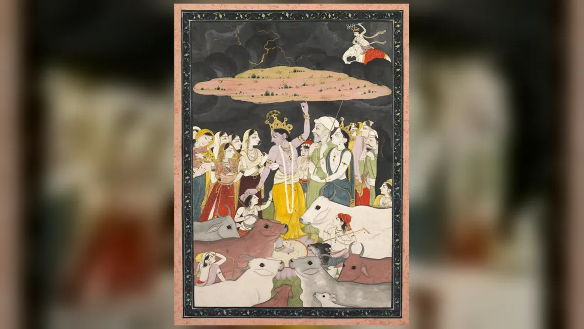 गोवर्धन पूजा 2026: पूरी कथा, पूजा विधि, शुभ मुहूर्त, अन्नकूट और परिक्रमा Govardhan puja katha: श्रीकृष्ण छोटी उँगली पर गोवर्धन पर्वत उठाए हुए, नीचे राधा, बलराम, ग्वाले और गायें, ऊपर ऐरावत पर इंद्र